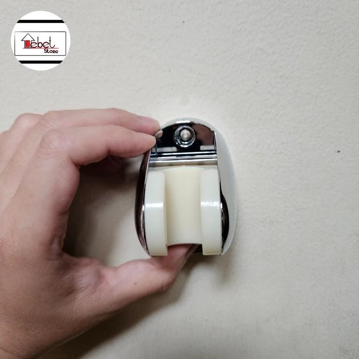 dudukan jet shower toilet tempel