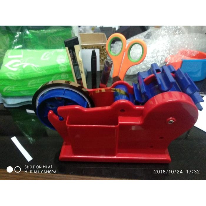 

PROMO! Alat Pemotong Lakban Dispenser Putar Aman Canggih Mesin Semi Otomatis