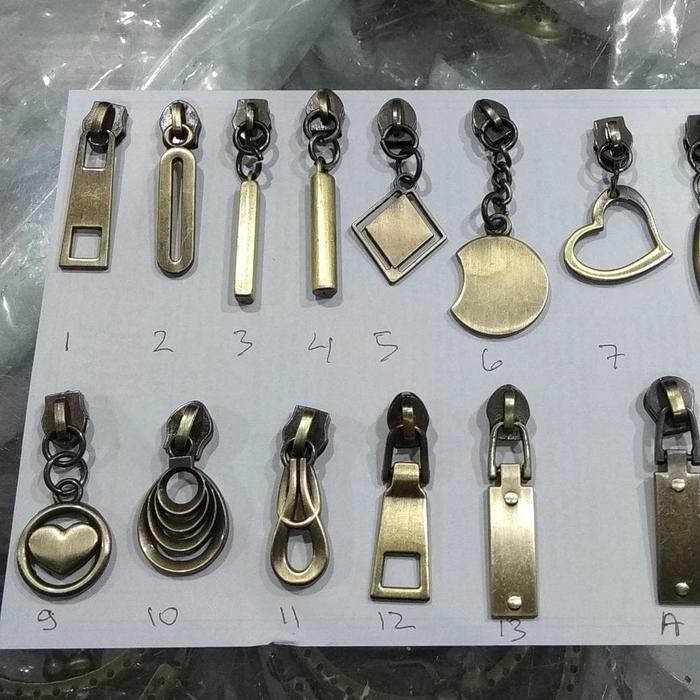 

Kepala Resleting Gigi Plastik MIB1 Uk. 5