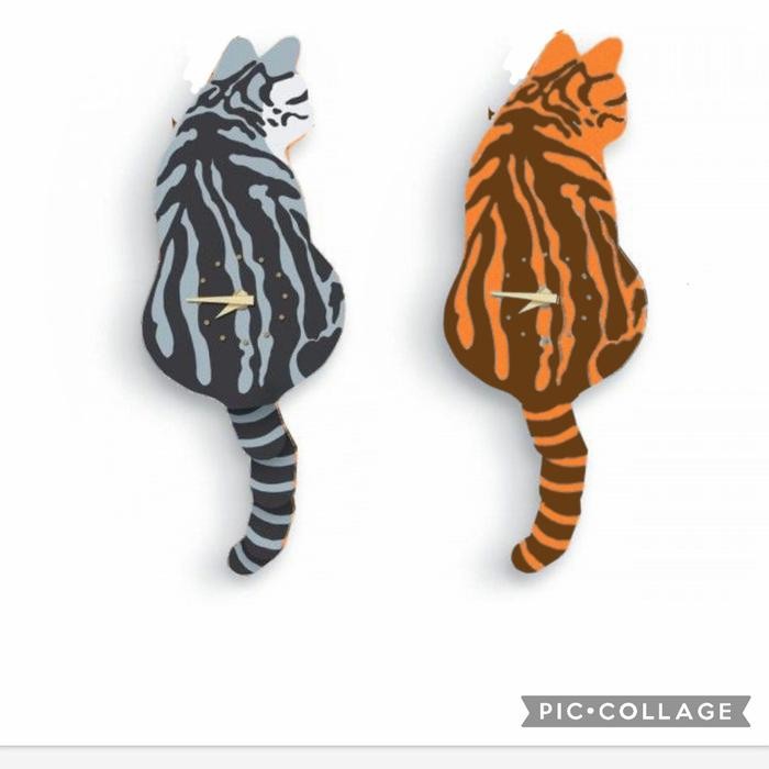 jam dinding ekor goyang kucing belang tabby