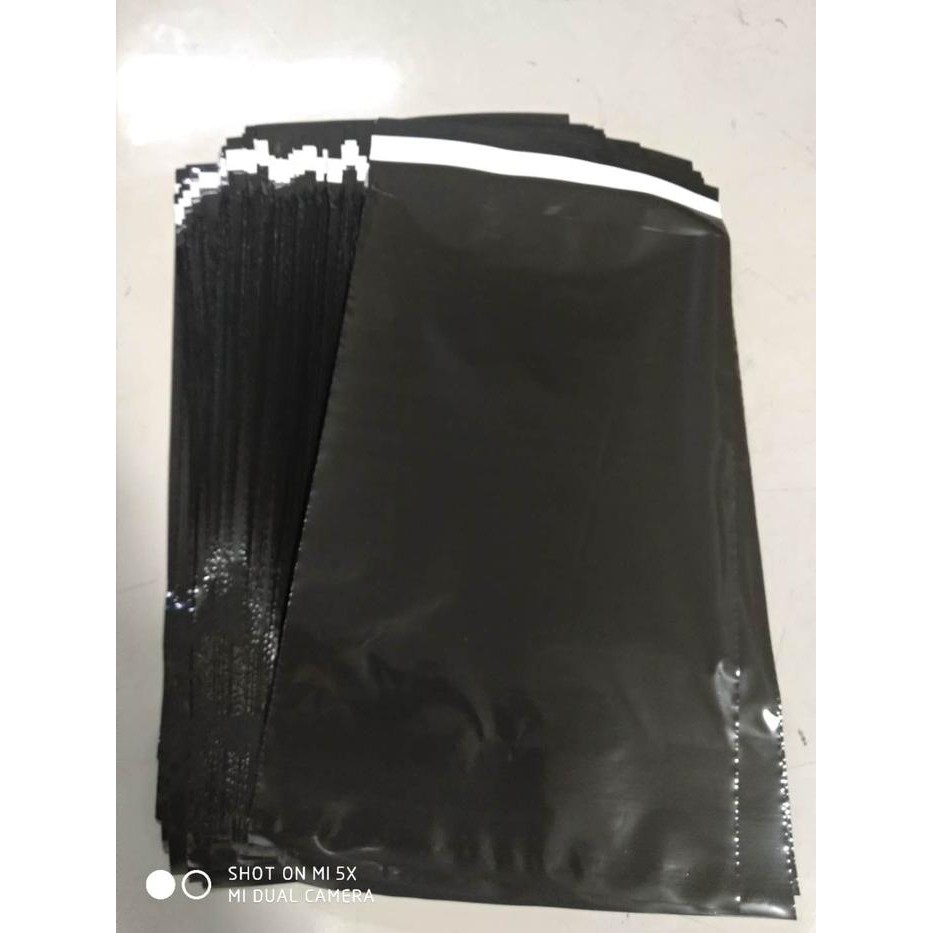 

Kantong plastik kurir , DHL , courier, polymailer warna hitam 17*30 MINIMAL ORDER 5
