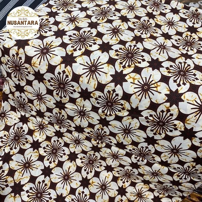 kain batik jarik motif kawung latar putih coklat bahan katun nusantara