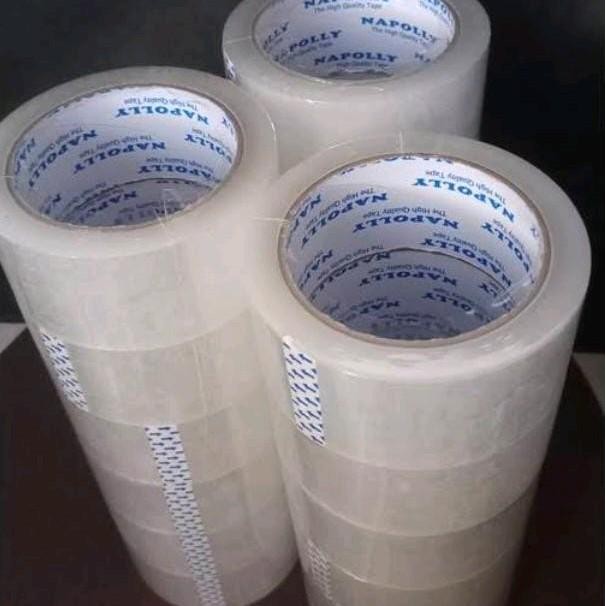 

AT Lakban bening napolly 90yard 1roll isi 6pcs