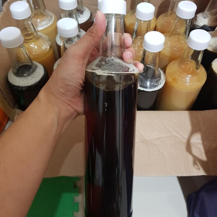 

Madu Hitam Hutan Liar 700Ml