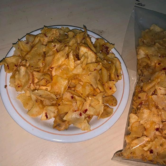 

KRIPIK SINGKONG RASA KETUMBAR PEDAS BERAT 250G DAN 500G MAKANAN KERIPIK CAMILAN