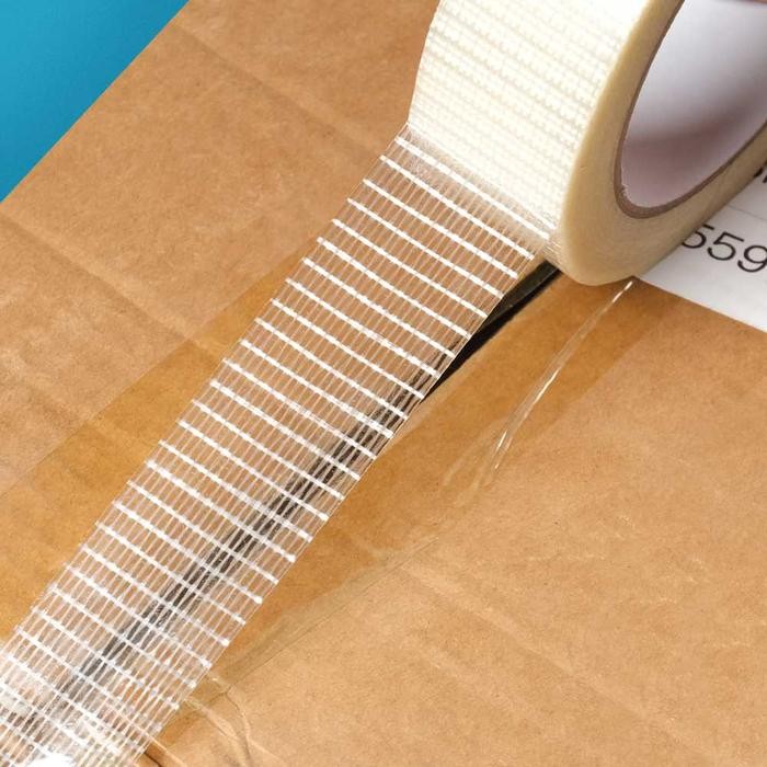 

Lakban Kuat Serat Fiber Super Strong Grid Fiber Tape untuk Packing Berat