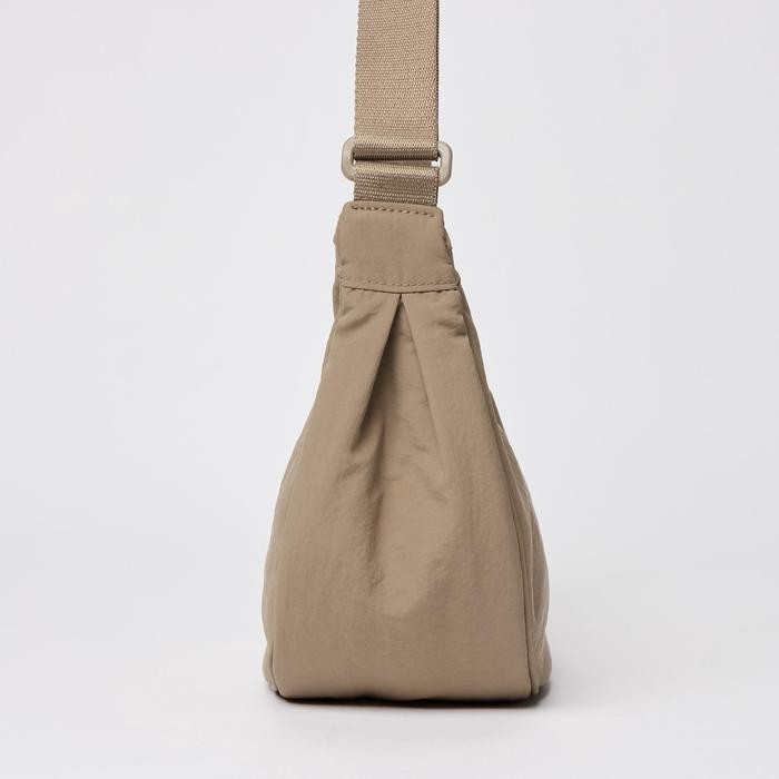 Tas Bahu Mini Bulat Uniqlo 457155 Original Cowok Cewek Unisex Keren