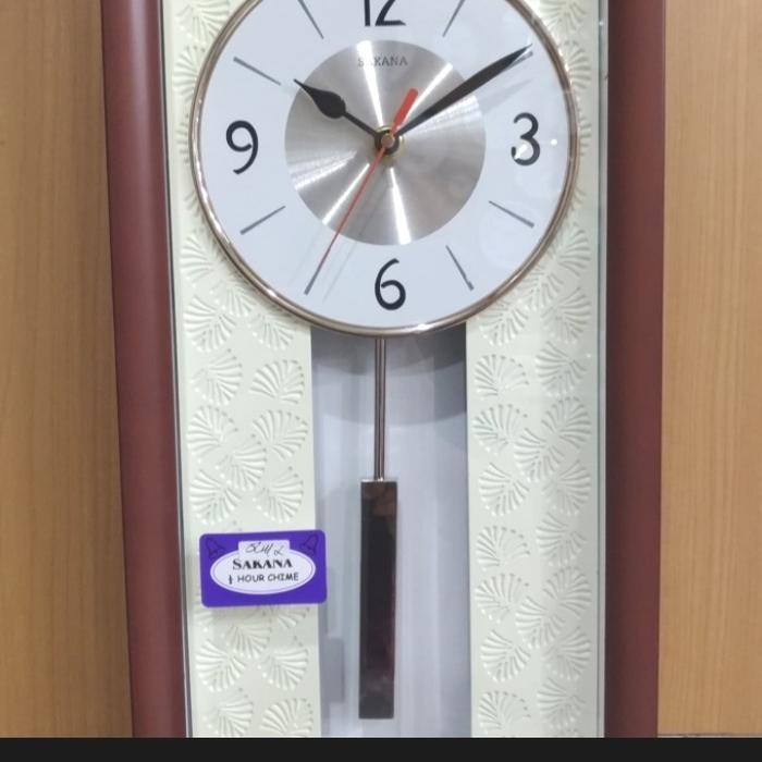 Jam Dinding Sakana 389 Fiber Bandul Melody Lonceng Tiap Jam
