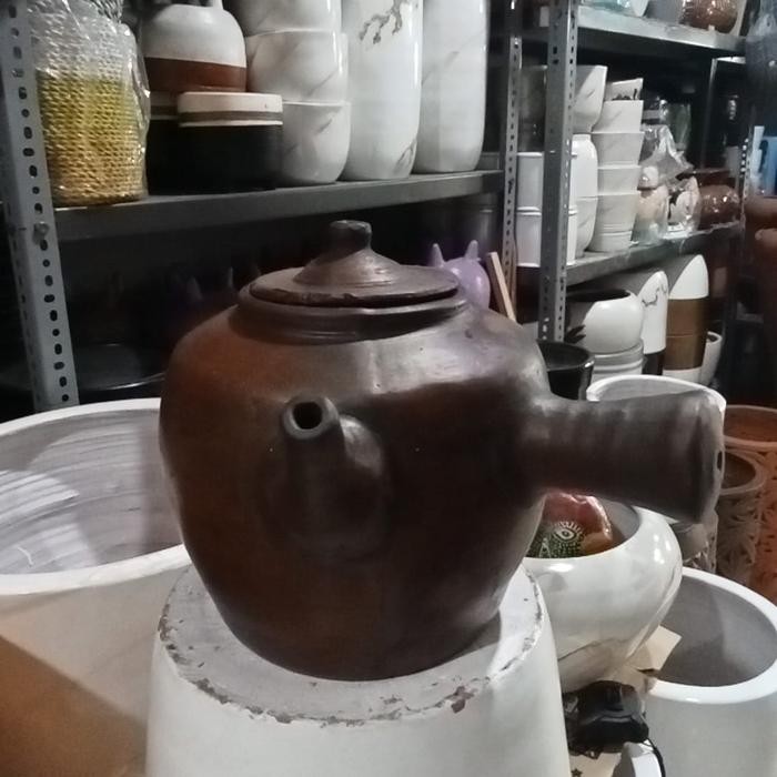 kendi gerabah rebus jamu // obat tradisional // tanah liat *