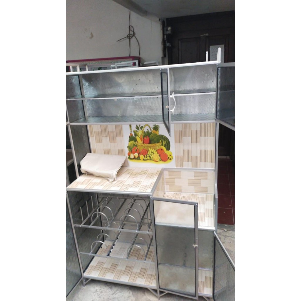 Lemari Piring Rak Piring Kaca 3 Pintu Alas Keramik Magic Seng Bogor