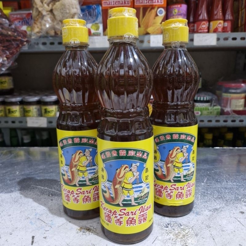 

KECAP IKAN 700 ml | KECAP SARI IKAN PANGGUL | NG LU | NGLU / Kecap Ikan Asli Kalimantan / Kecap Ikan Botol Besar / Kecap Ikan Untuk Masakan Laut