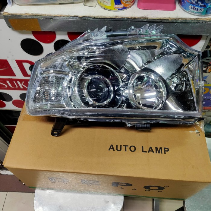 lampu besar kiri depo mitsubishi Pajero L200 thn 2009 up