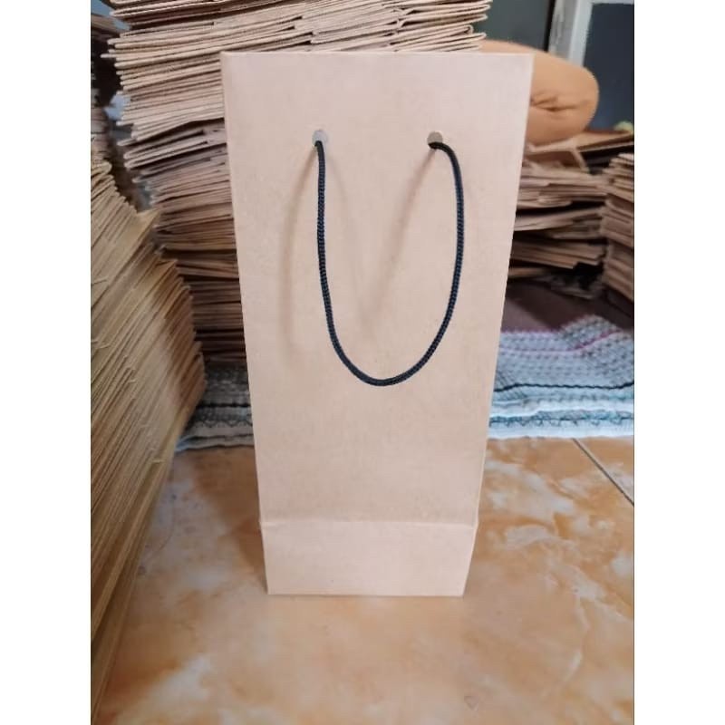 

Paper Bag Coklat Polos Ukuran 10x10x35 (paket 12pcs) |Tas Kertas |Tas Kado |Tas Souvenir |Paper bag Hampers