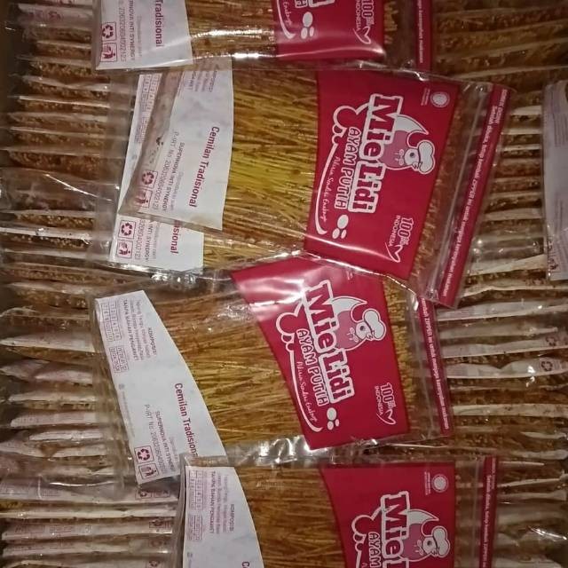 

Mie Lidi Ayam Putih Kemasan Baru Cemilan Tradisional Rasa Asin Dan pedas Gurih