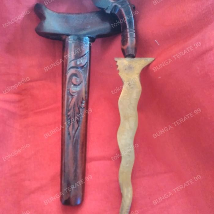 

keris kuningan kaligrafi