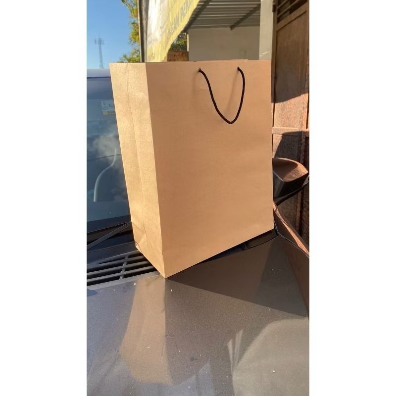 

Paper Bag Coklat Polos Ukuran 26x13x33 (Paket 12pcs) |Tas Kertas |Tas Kado |Tas Souvenir |Paperbag Hampers