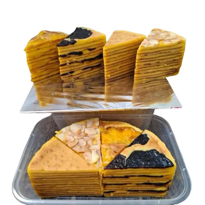 

Kue lapis legit empat sultan ukuran 1/2 loyang bulat (8x16cm) rasa premium, almond, cempedak, prunes