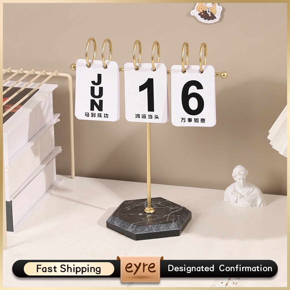 

Eyre Ornamen kalender flip berbentuk T yang kreatif, dekorasi kalender kantor kamar tidur rumah sederhana, alat peraga pemotretan kalender Creative T-shaped flip calendar ornaments simple home bedroom office calendar decoration calendar shooting props