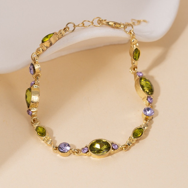 Glamourgemss Gelang Rantai Kristal Hijau Wanita Emas Muda Anti Karat Berwarna Permata Fashion