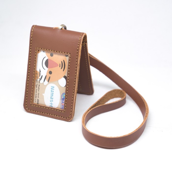 

Lanyard Id Card Nametag Coppo Bahan Kulit Sapi Model Lipat 1 Muka Kode 1235