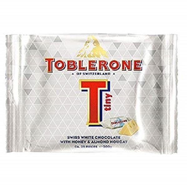 

JTTOP" COKLAT TOBLERONE TINY WHITE 200GRAM ISI 25PCS SILVER EDITION ASAL SWIS