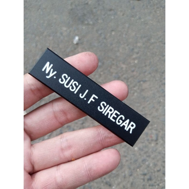 

Nametag Persit hitam full 2x8cm font Arial (Sesuai Mupus)