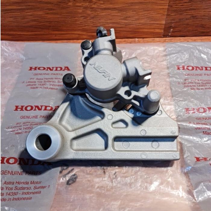 terbaru  (crf150) honda ori - brake caliper/ kaliper belakang plus kampas rem 43150k84901 asli