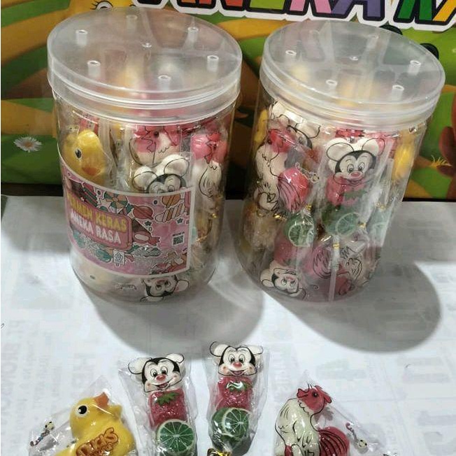 

Permen Lollipop Aneka Rasa Buah Bentuk Bebek, Mickey, dan Ayam Jago - 1 Toples Isi 30 Pcs - Lolipop,