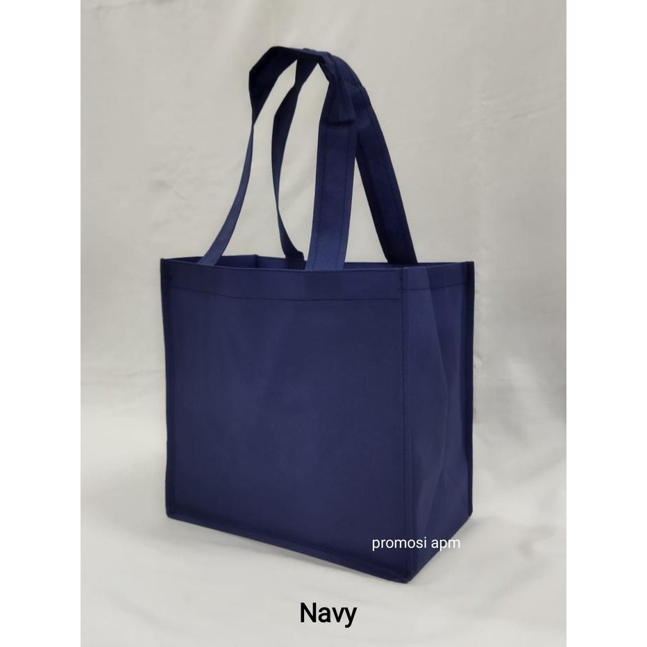 

Happy- Tas Spunbond Jahit Kue Brownies Ukuran 33x15x25cm