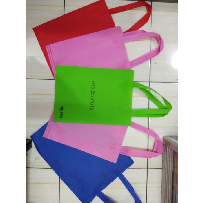 

Flashshow Goodie Bag Handle Tali 25x35x6 - Tas Kain - Spunbond