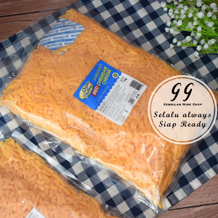 

SHREDDED RED CHEDDAR Cheese Green Valley 1 KG Keju Parut Merah