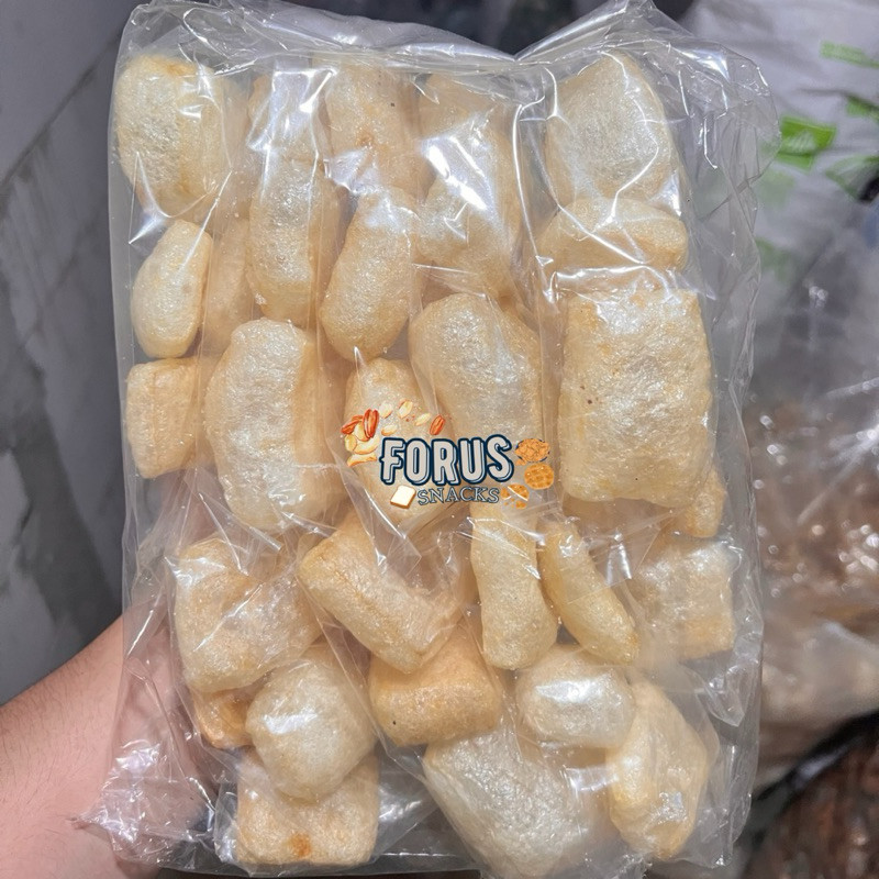 

Kerupuk Kulit Sapi Padang / RAMBAK Cap MARWAH MURAH ENAK HALAL RENYAH 1 Pack isi 12 Pcs