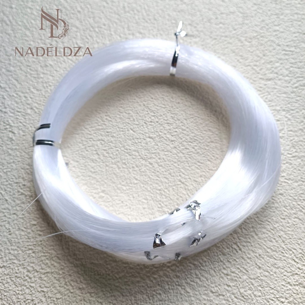 

Tali Senar Bening Non Elastis 0.4mm