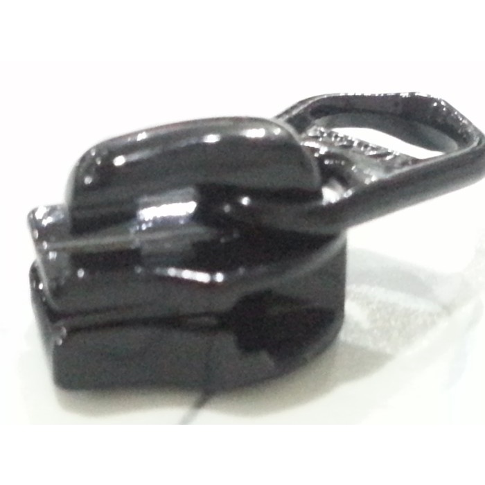 pintar-  Kepala resleting YKK terbalik untuk daun coil no.5 coil pendek bulat.