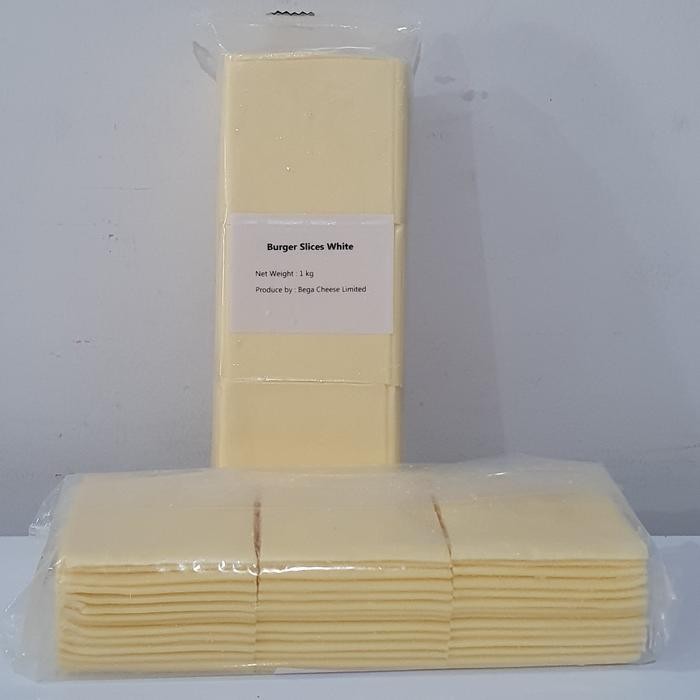 

BARANG TERLARIS Bega Cheese Cheddar Process Slice White Burger 1Kg