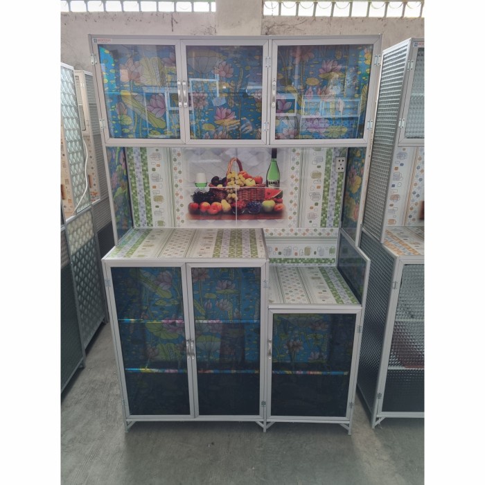 Rak Piring 3 Pintu Kaca Motif Bunga Alunium