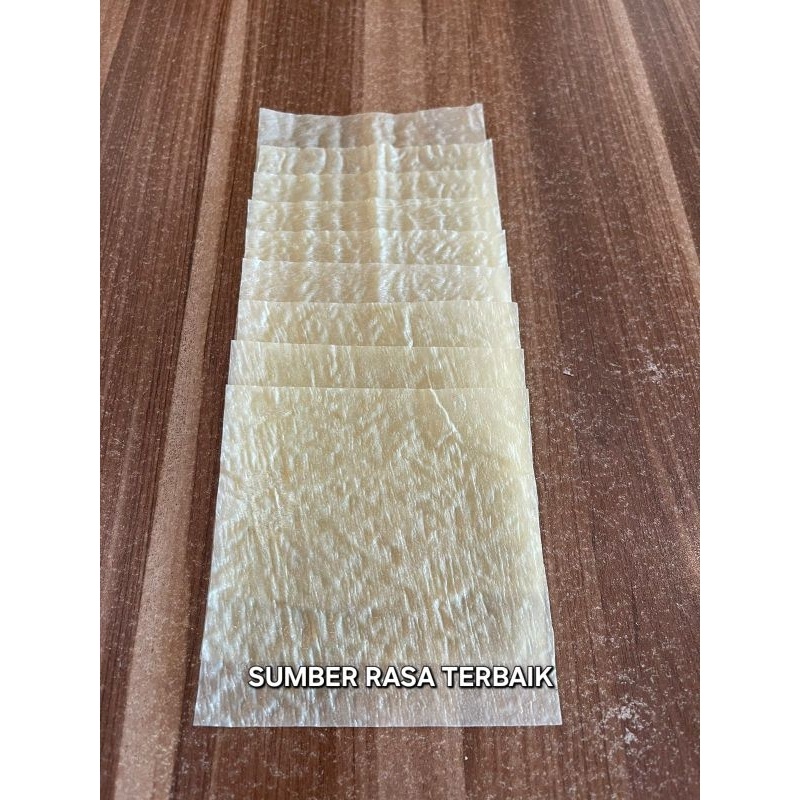 

SRT - KULIT TAHU TAWAR PUTIH UK 10X10 ISI 50PCS HALAL TEKSTUR LENTUR UNTUK DIMSUM,HEKENG,EKADO