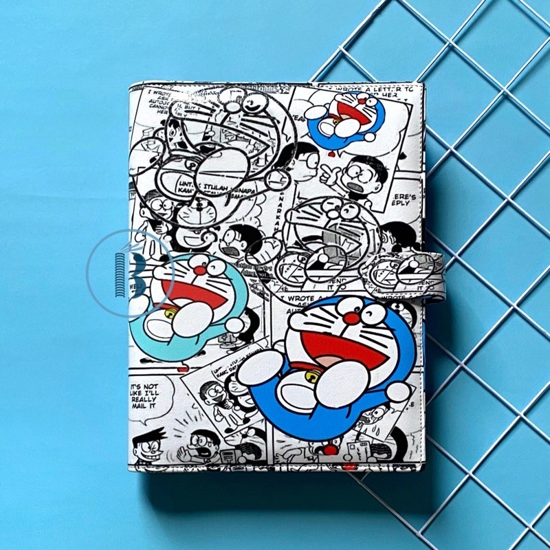 

Binder READY Motif Doraemon Comic Printing Kulit Multiring 20ring A5 26ring B5