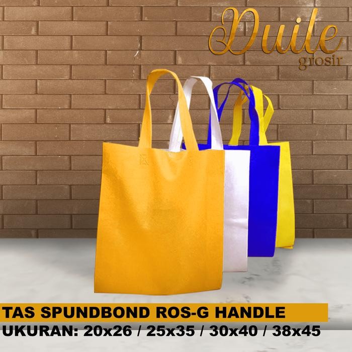 

Pesta- Tas Spunbond Handle / Goodie bag / Ukuran 25x35 (1 Lusin)