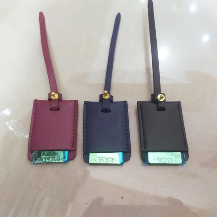 

Accesories T U M I Name Tag Wanita