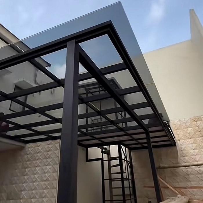 Kanopi holo kaca tampered 8mm rangka 5x10 bentangan dan tiang 10x10 galpanis Besi