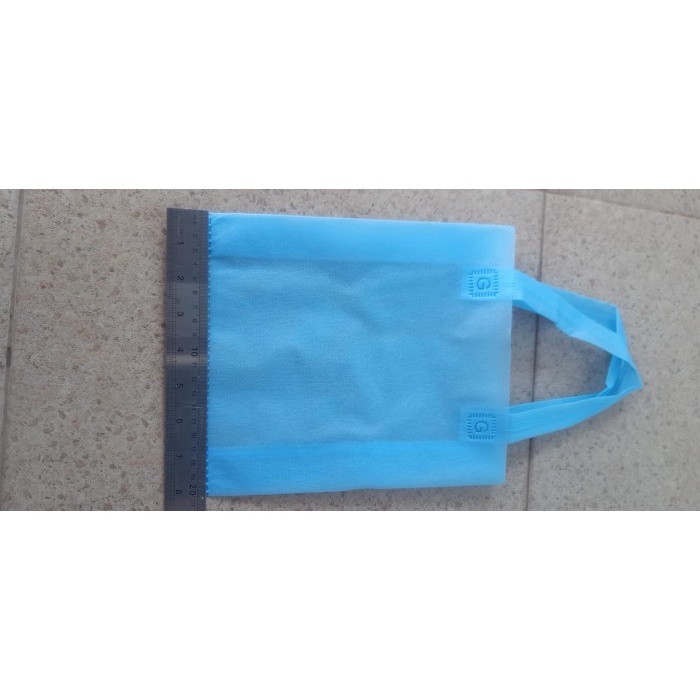Flashshow tas spunbond polos mini 20x25
