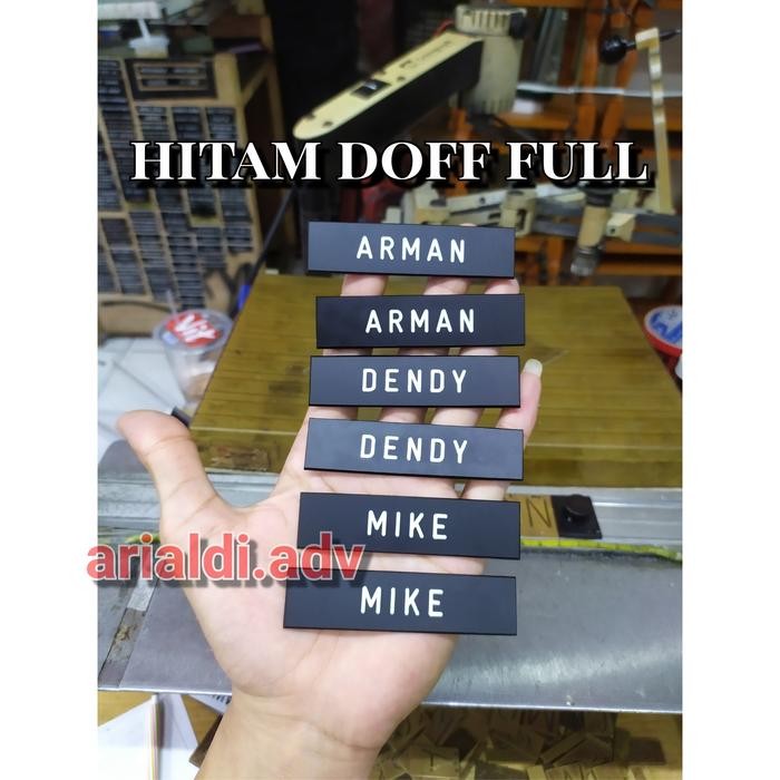 

satu set nametag hitam doff dan pin korpri eching kulit jeruk magnet