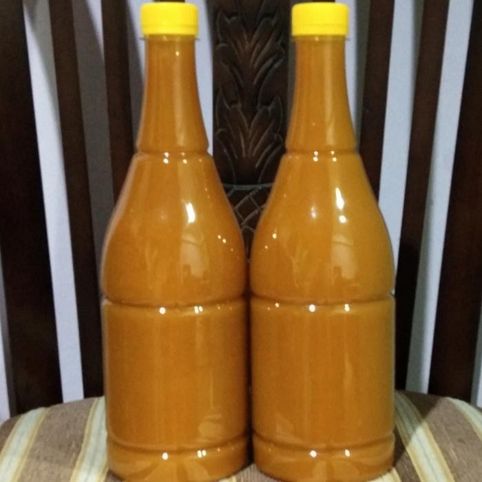 

Terlaris Jamu Kunyit Plus Jahe Merah 1Liter/Jamu Kunyit Asem Jahe Merah