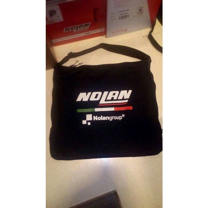 TAS HELM LOGO NOLAN