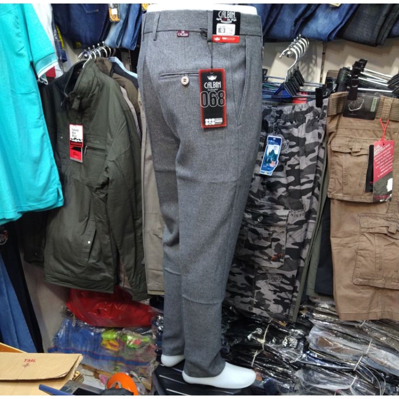 sale CELANA BAHAN PRIA SLIMFIT, KANTOR /FORMAL CALBIN "original" bahan wol slimfit