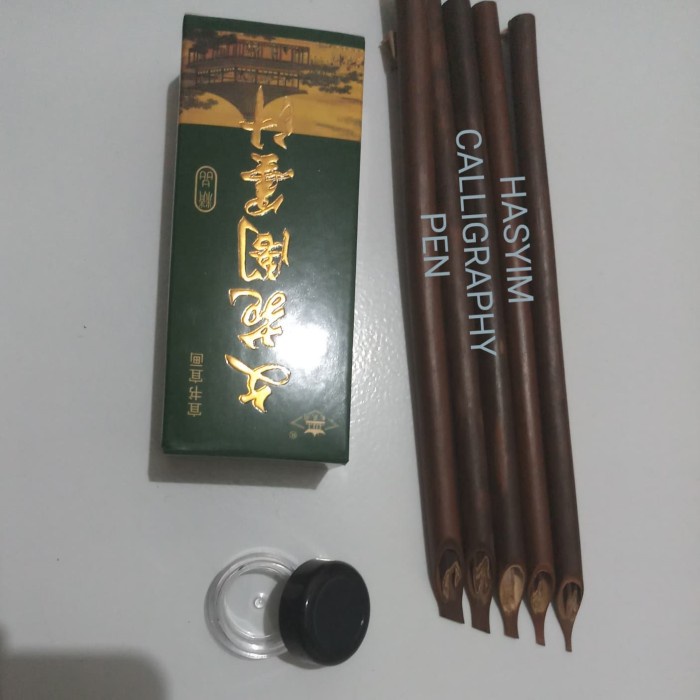 

PAKET HANDAM POTONG + TINTA CINA 100 GR + TEMPAT TUTUL TINTA