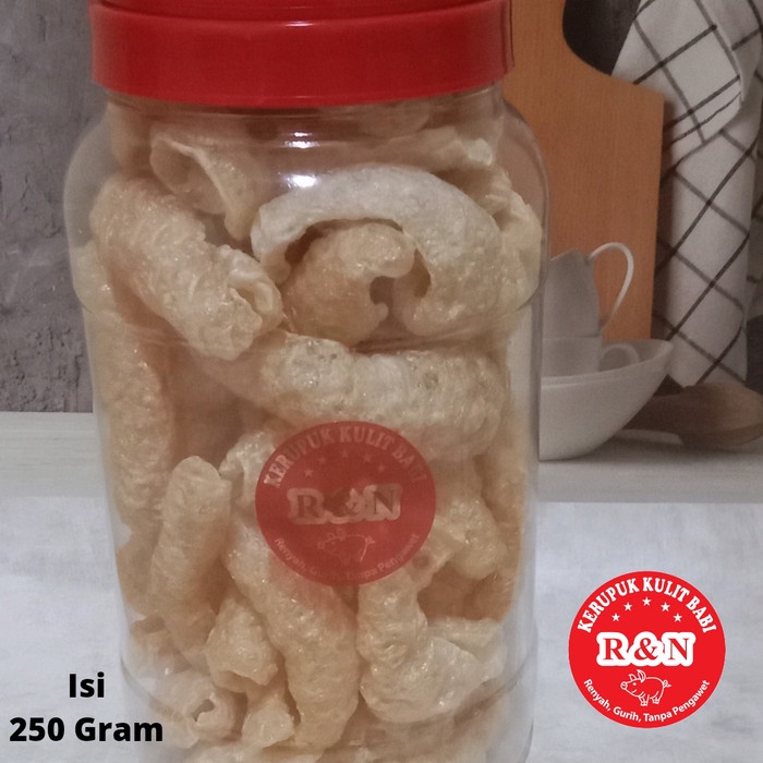 

KERUPUK KULIT/RAMBAK BABI IMPORT CU JIU CHA MEREK R&N 3L/250G PREMIUM