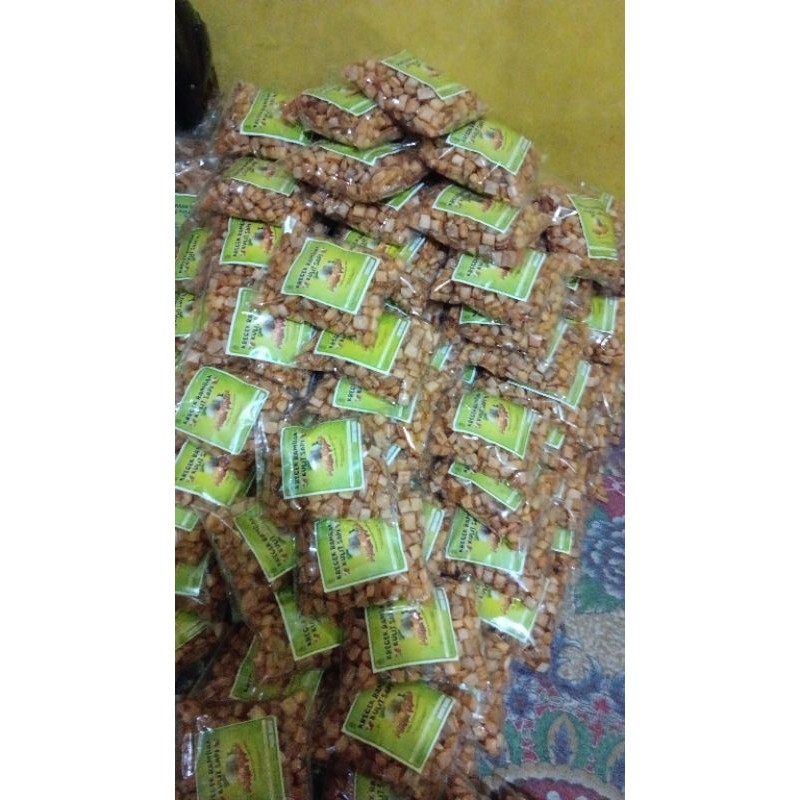 

Sega Tungtung Krecek Rambak Kulit Sapi/Krupuk Rambak Kulit Sapi 1 Kg Varian Dadu .