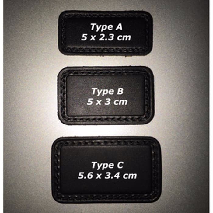 TUMI PATCH MONOGRAM EMBOSS